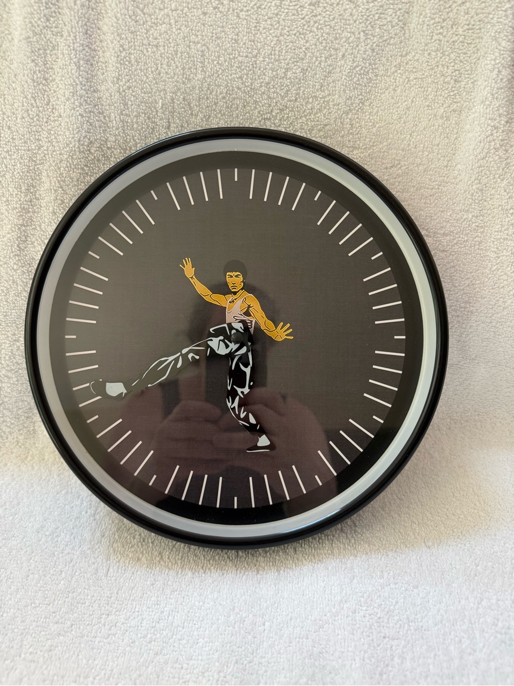 Black Wall Clock with Yellow Accent Bruce Lee Figure